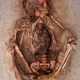 This child’s face was painted with a red cinnabar-based pigment and the archaeologists believe that their chest was cut open to remove the heart as part of a sacrificial ceremony.